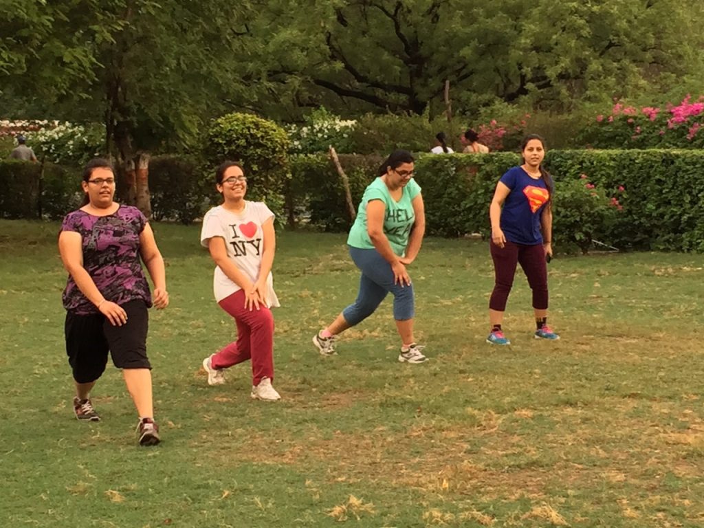 A person working out in a fitness gym, focused on getting fit.